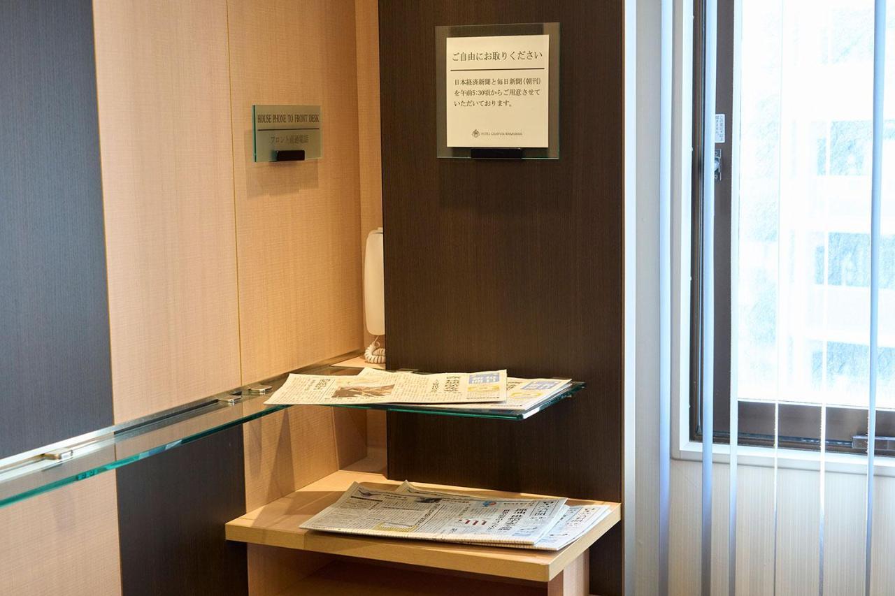 Hotel Granvia Wakayama Eksteriør billede A glass shelf
