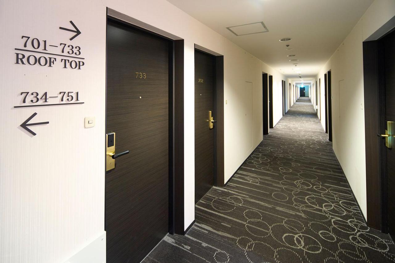 Hotel Granvia Wakayama Eksteriør billede A typical hotel corridor